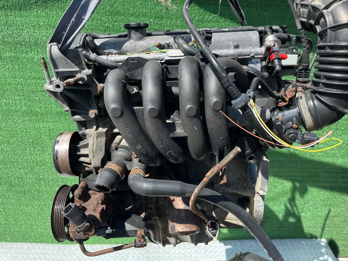 Двигатель Ford Focus 1.4л 2000 — фото 4
